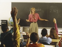 Classroom superstars with hands raised