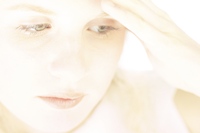 Close-up photo of a girl's expression of worry and fear.