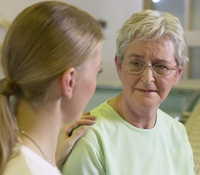 Giving comfort, to illustrate comforting a grieving widow.