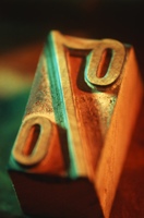 Percent sign, tying in with the 1% and 99%.