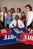 Politics photo, group of people watching intently.