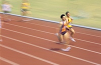 Runners racing on a track, to illustrate our spiritual race.