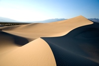 Shifting sand illustrating the shifting alliances in the Middle East.